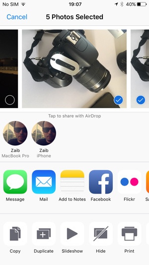 how do i send photos from one iphone to another iphone